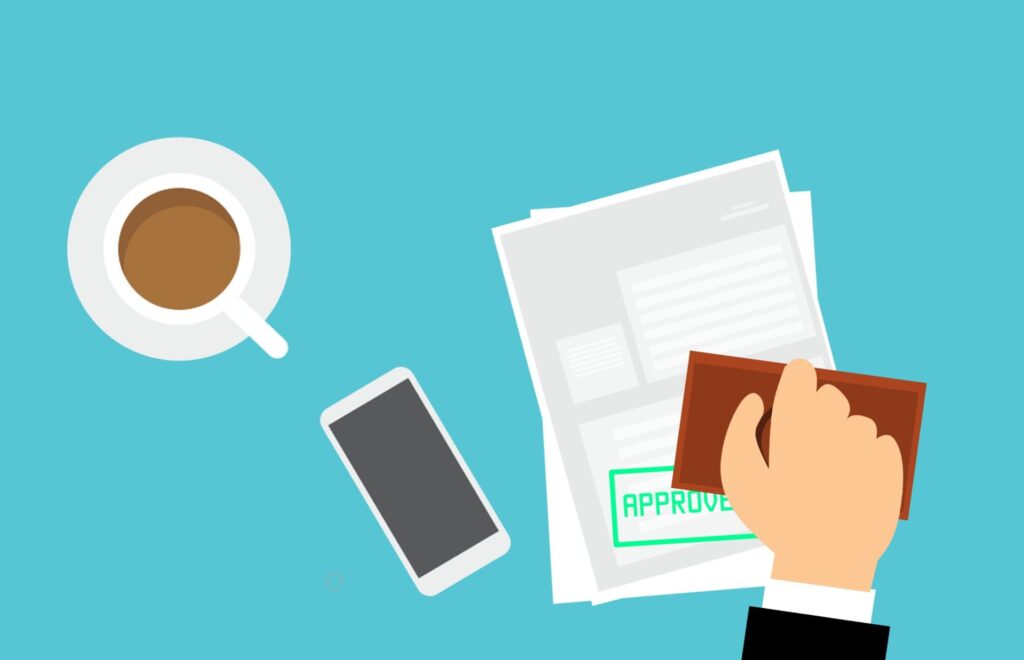 An illustration of a hand stamping a loan document with a green 'APPROVED' stamp, symbolizing a successful loan pre-approval